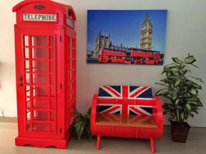 Отель Odessa Guesthouse  Triharjo